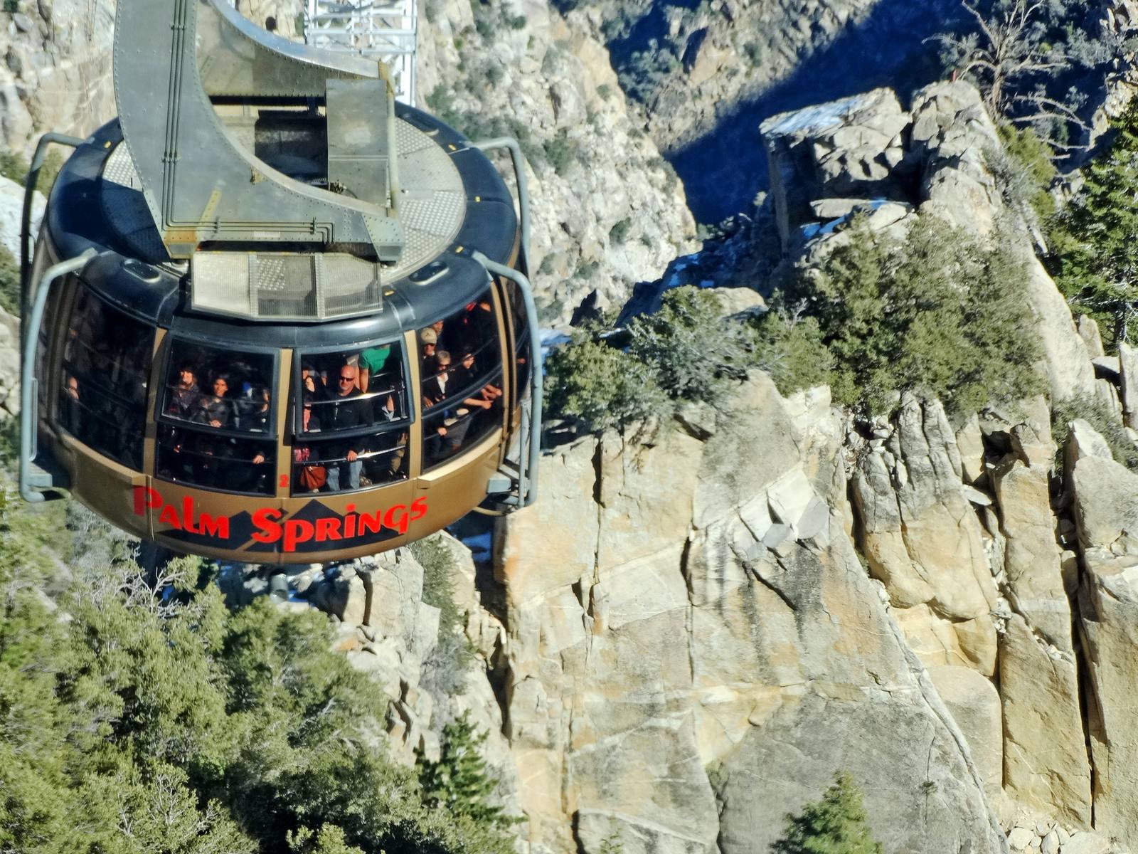 The Palm Springs Aerial Tramway. The cars climb about two and a half miles, and their floors rotate once or twice during the ride.