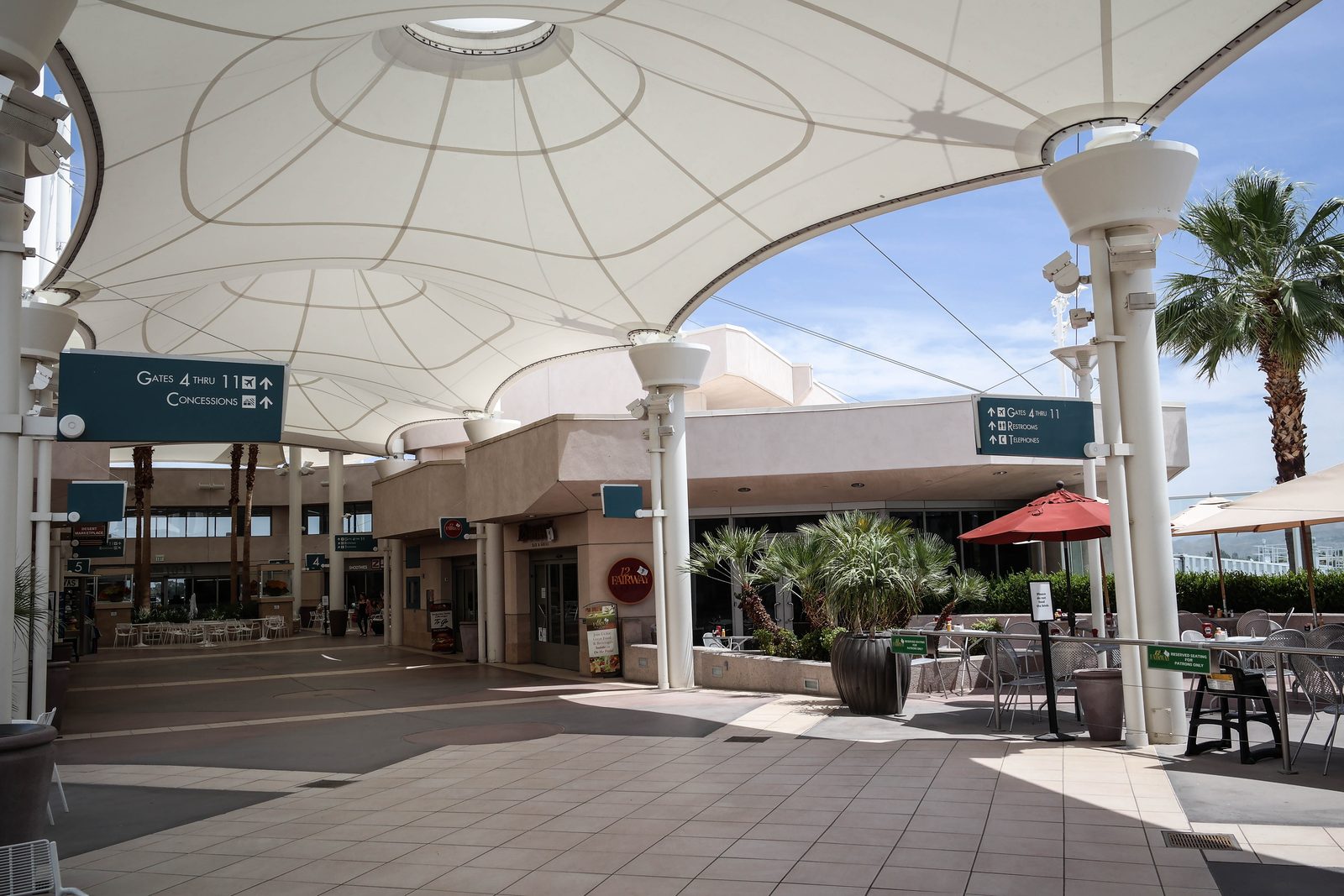 The open-air courtyard at Palm Springs International Airport. The airport handled 2.21 million passengers through August 2026.